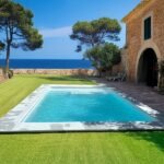 Piscina 7x4 de fibra con playa Palawan39